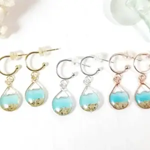 Aqua glow in the dark water sand mini hoop earrings