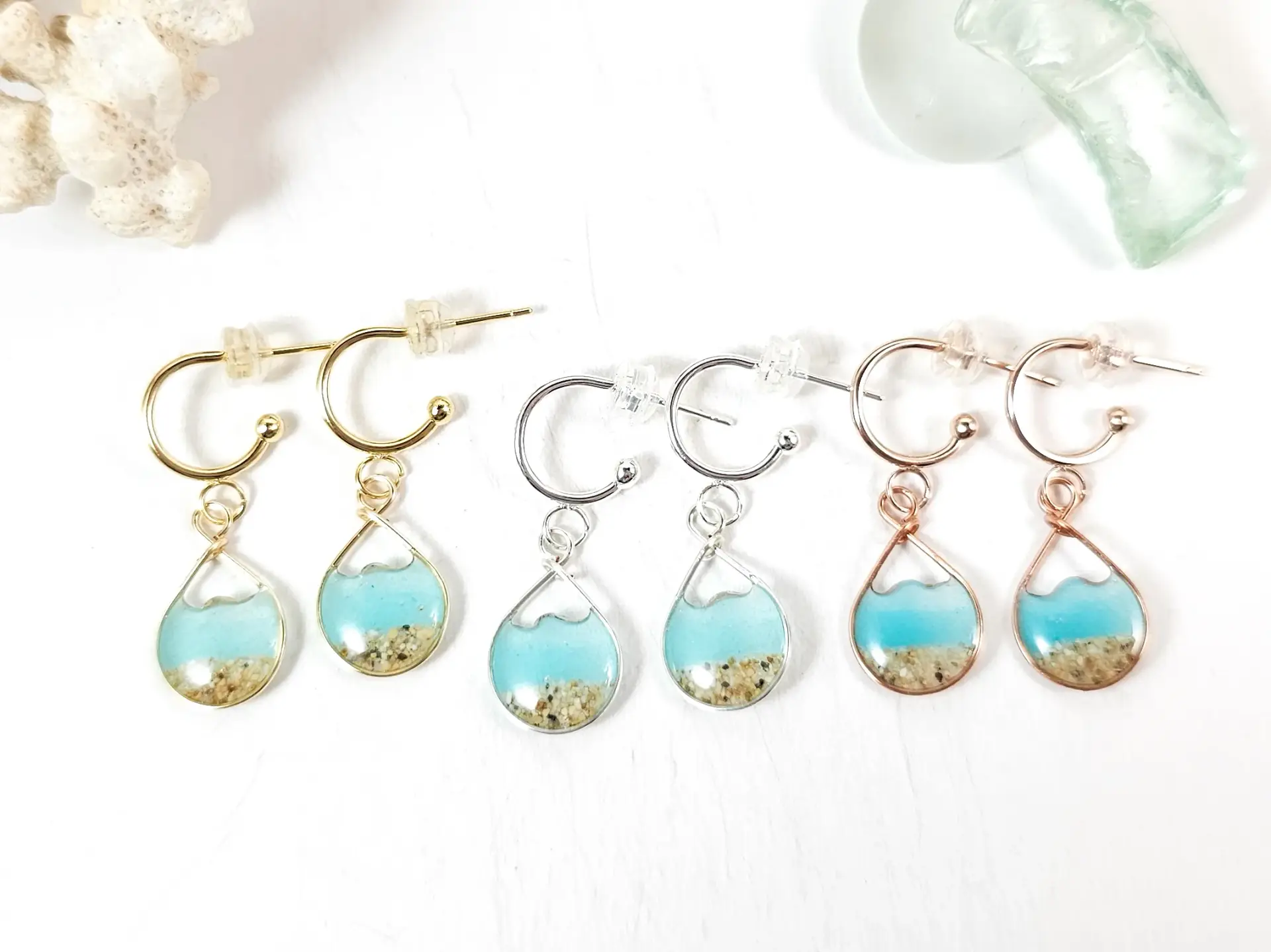 Aqua glow in the dark water sand mini hoop earrings