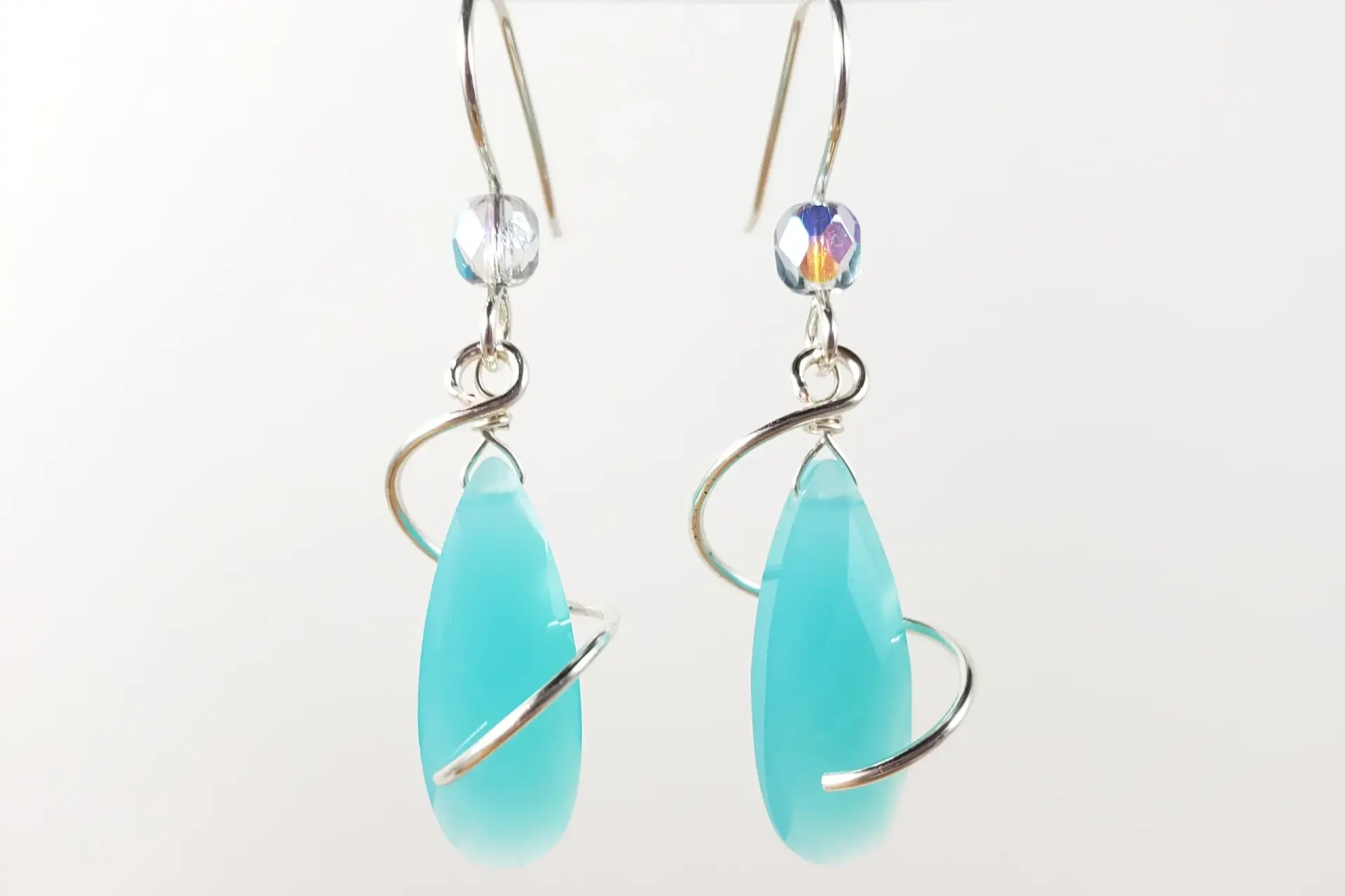 Milky blue crystal spiral earrings in yellow gold, silver, or rose gold - Image 7