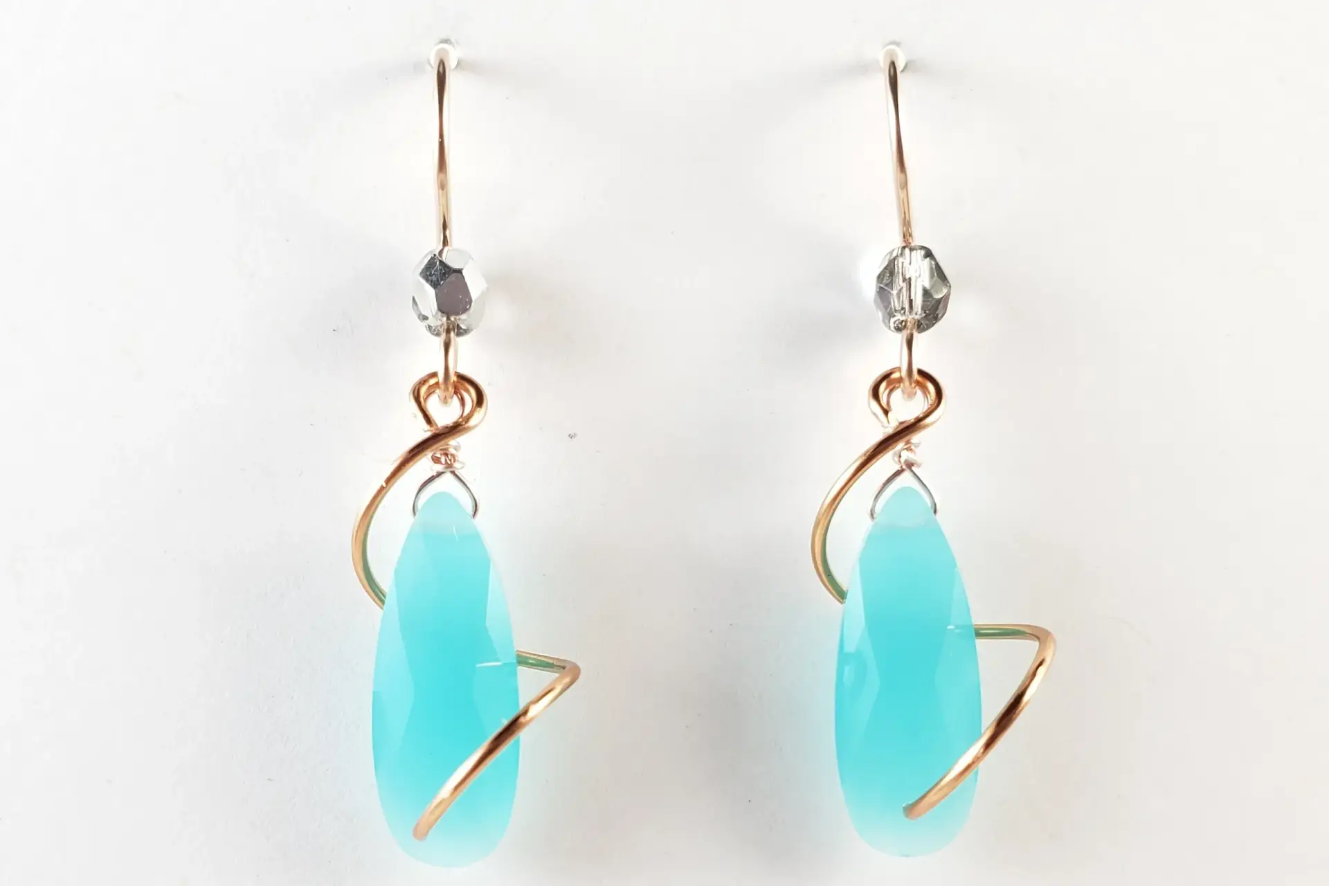 Milky blue crystal spiral earrings in yellow gold, silver, or rose gold - Image 4