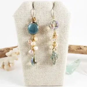 Teal shell crystal and pearl gold asymmetrical earrings