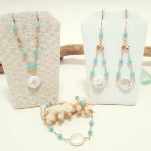 Aqua crystal and freshwater coin pearl earrings, necklace, and bracelet