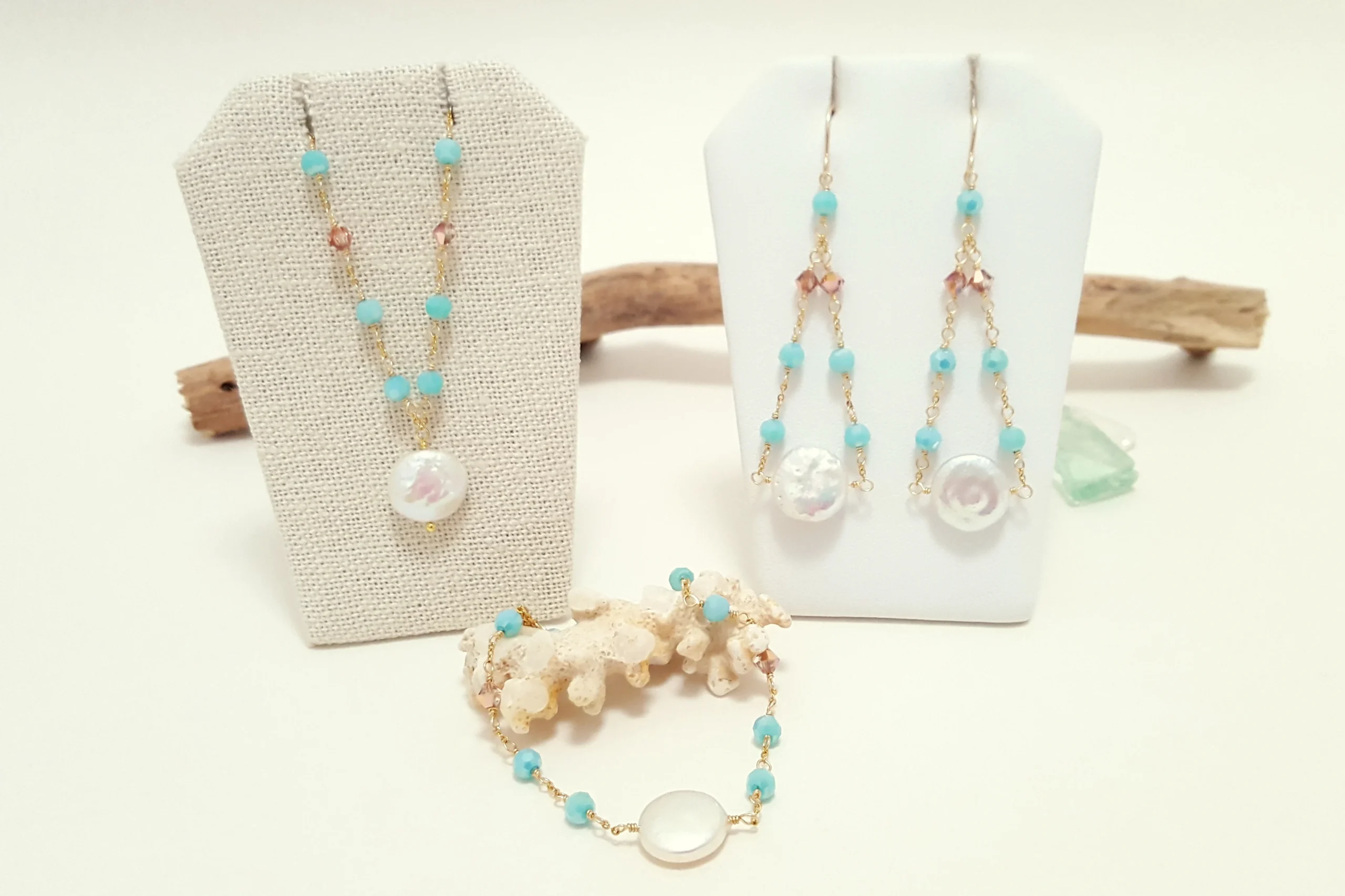 Aqua crystal and freshwater coin pearl earrings, necklace, and bracelet