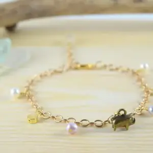 Pearl pig charm bracelet
