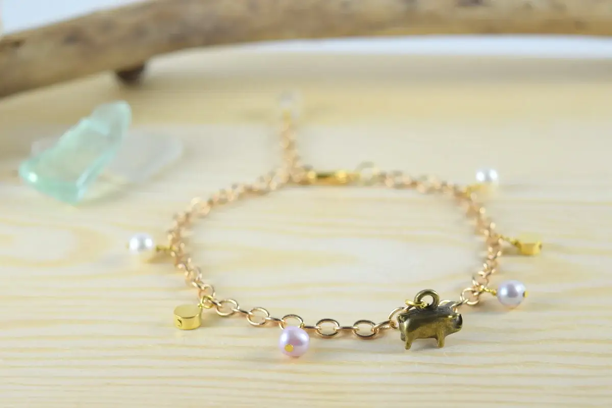 Pearl pig charm bracelet