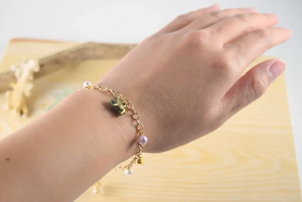 Pearl pig charm bracelet - Image 2