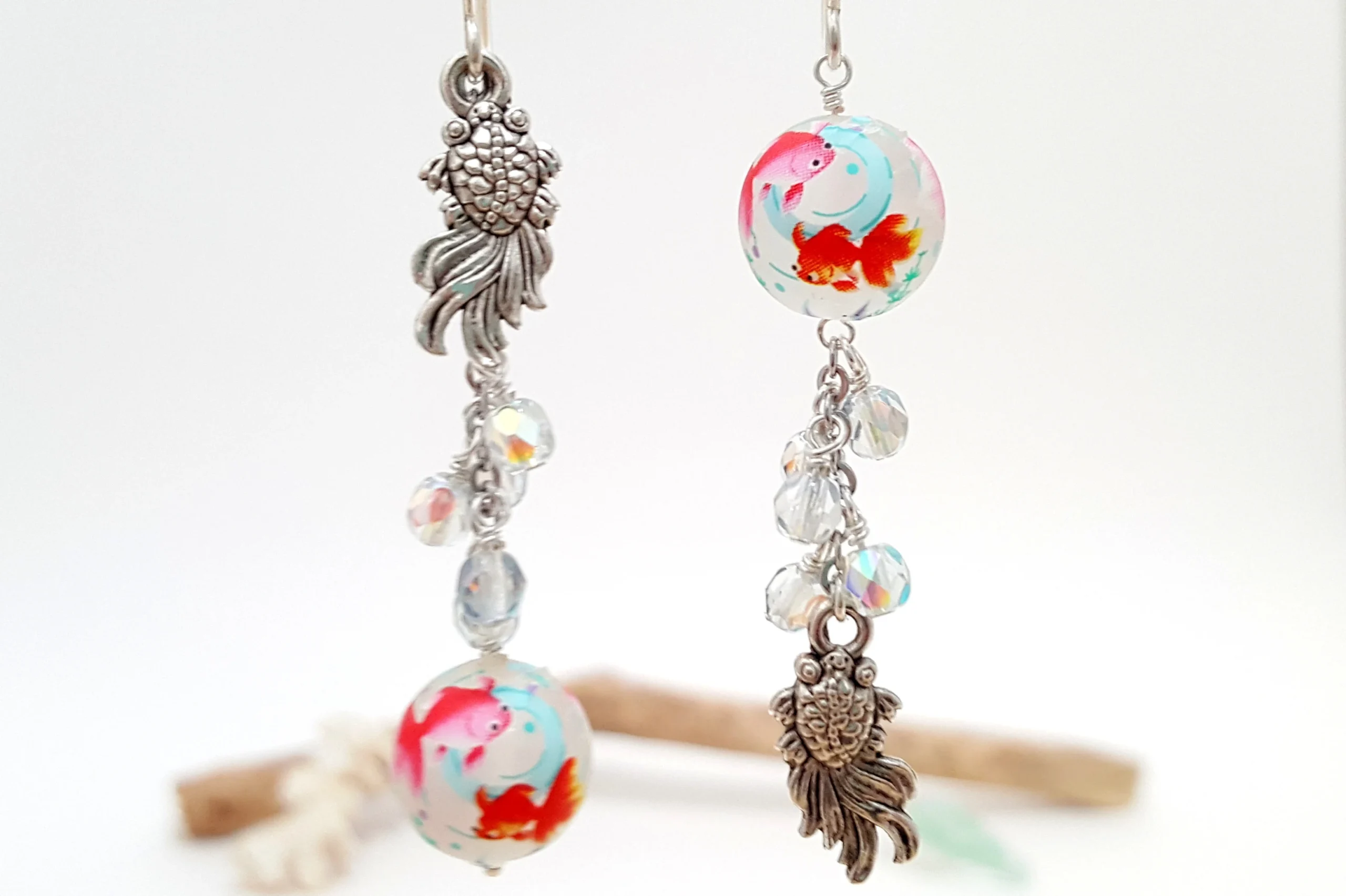 Goldfish asymmetrical earrings