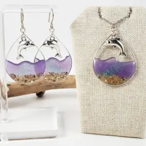 Sand and purple water with dolphins silver earrings and necklace