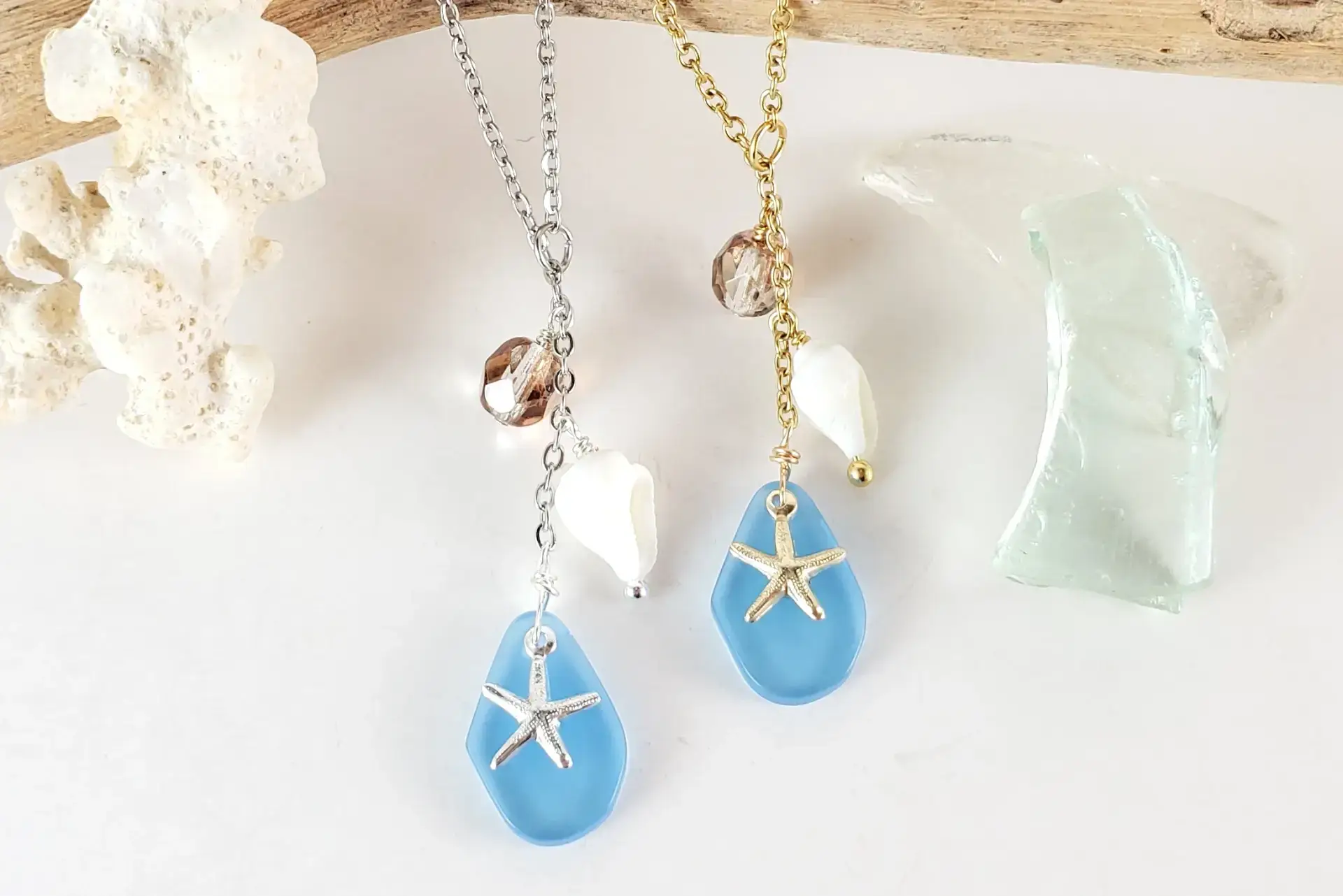 Blue sea glass, starfish, and shell necklace
