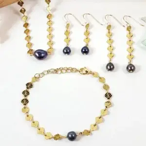 Shell chain and freshwater pearl earrings, necklace, and bracelet