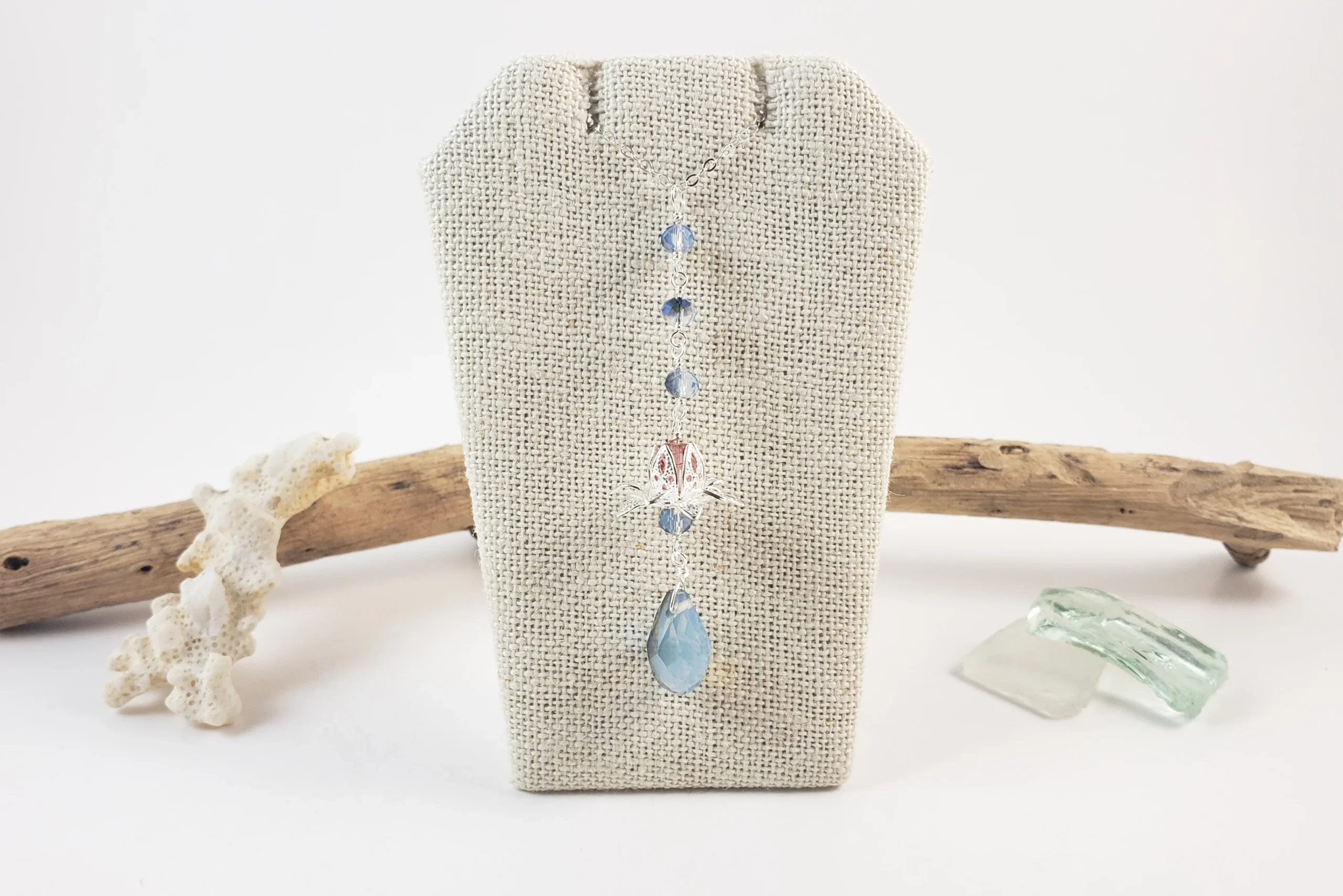 Silver lotus and blue crystal earrings and necklace - Image 6